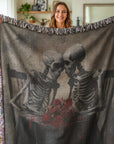 Skeletons at the Table Woven Blanket
